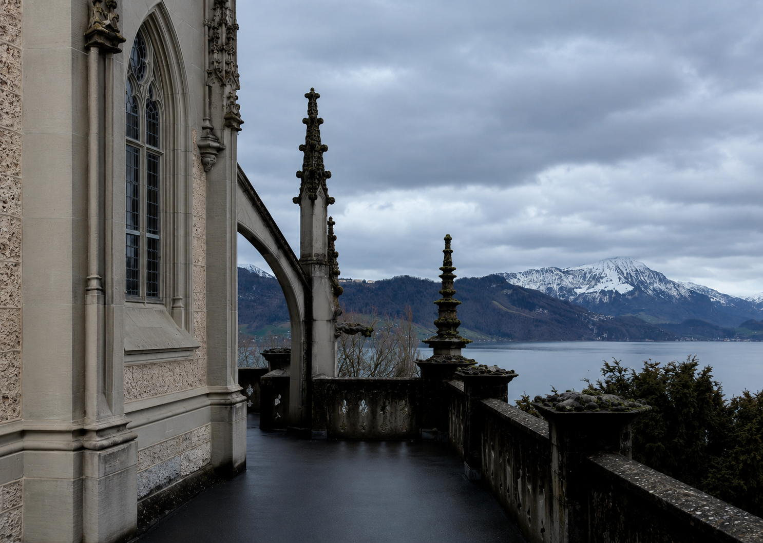 Historic architecture overlooking Lake Lucerne and the Swiss Alps